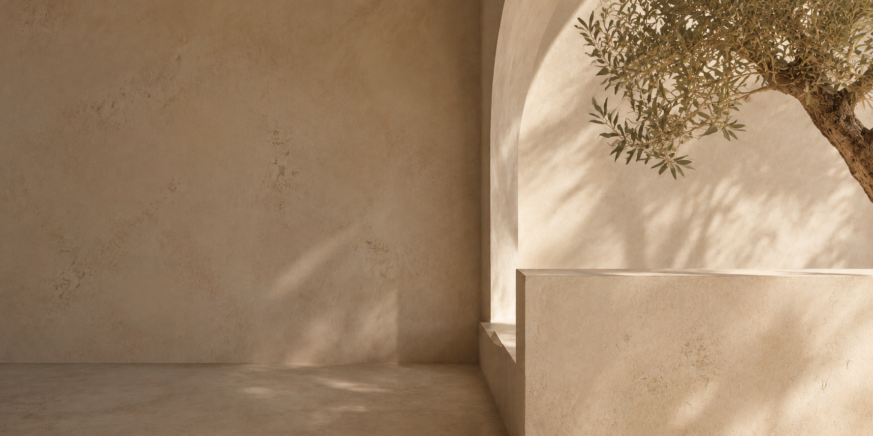 Sun-washed Mediterranean setting framed by a mature olive tree